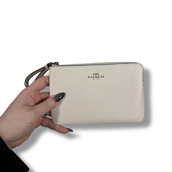 Coach Handbags - Coach Cream Saffiano Leather Wristlet Wallet